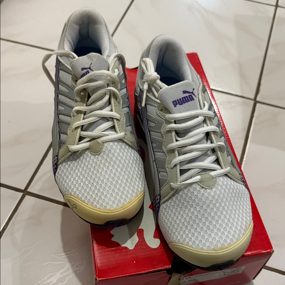 Puma sneakers. In purple and silver color